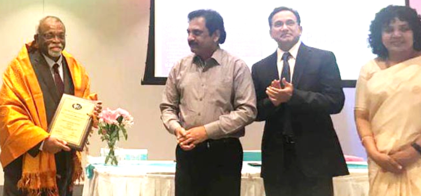 City based renowned ENT specialist, Dr E C Vinaya Kumar, bestowed with the GHCEH Award 2019 at AAPI Symposium in USA