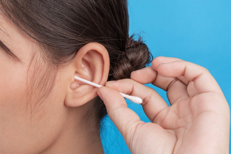 WHY IS MY EAR DRAINING YELLOW FLUID?